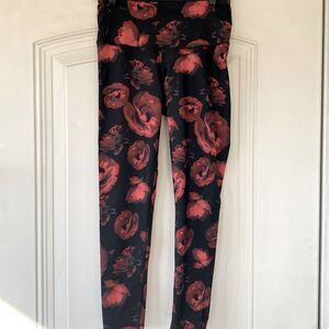 Victoria’s Secret sport leggings Black red floral print. Like new size medium.